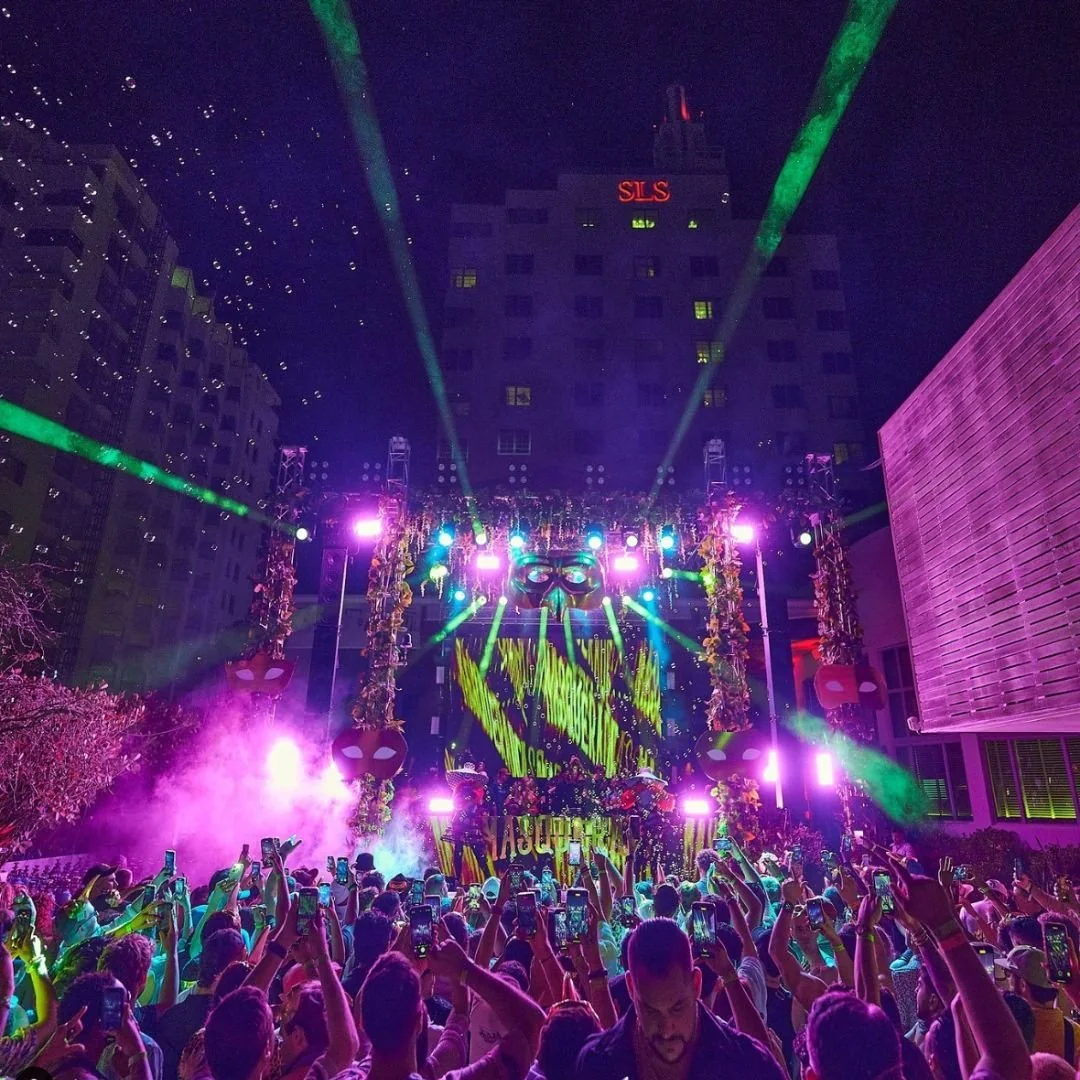 Nighttime concert at Hyde Beach with audience, stage lighting and LED screen