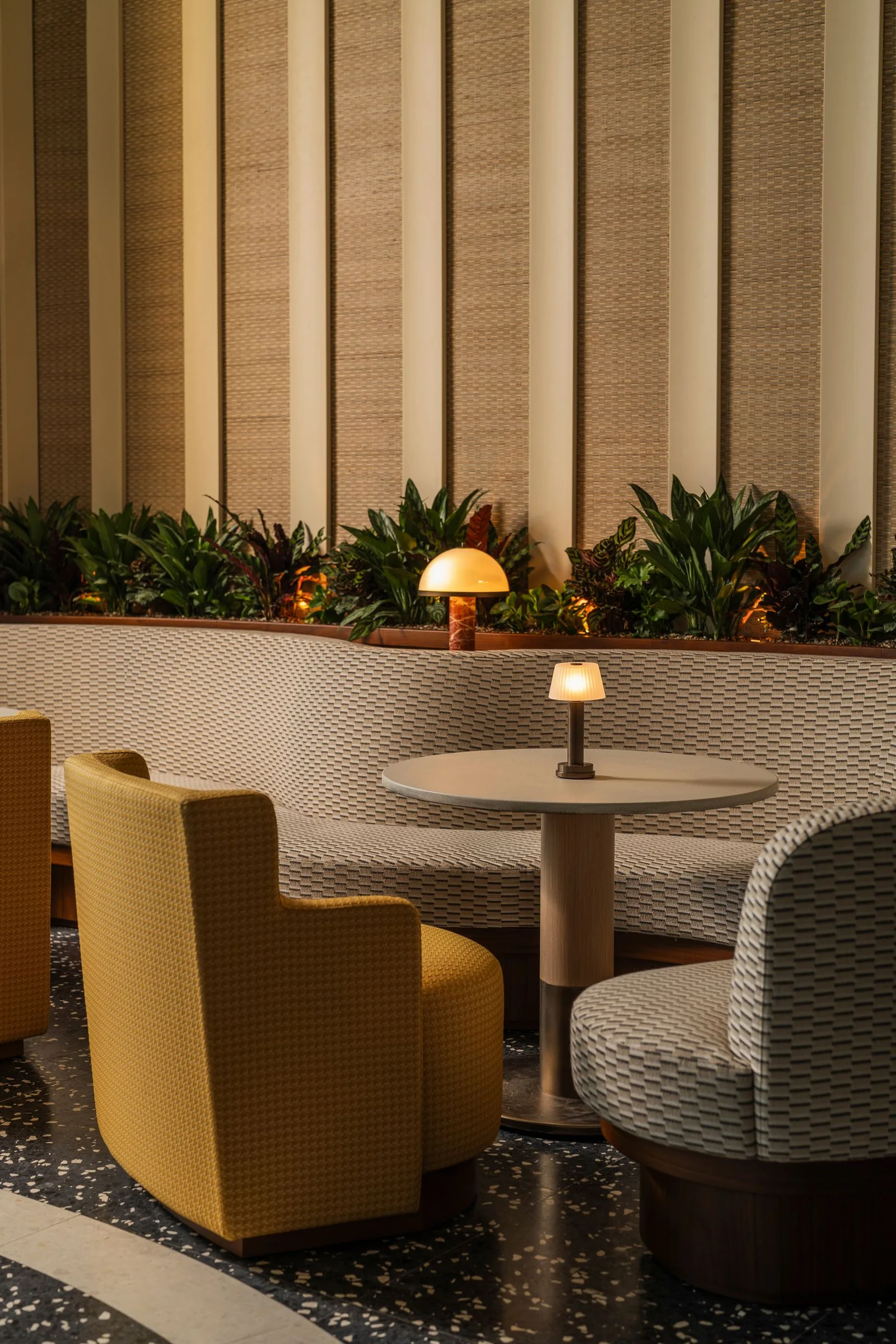 Lounge seating and architectural details inside SEIA Club on the 55th floor of 830 Brickell, Miami