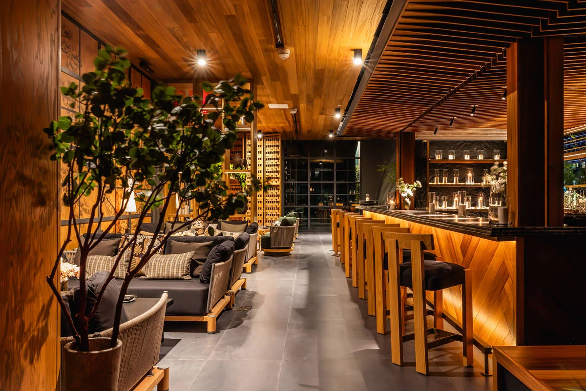 Warm wood bar and lounge seating at Yamashiro Miami